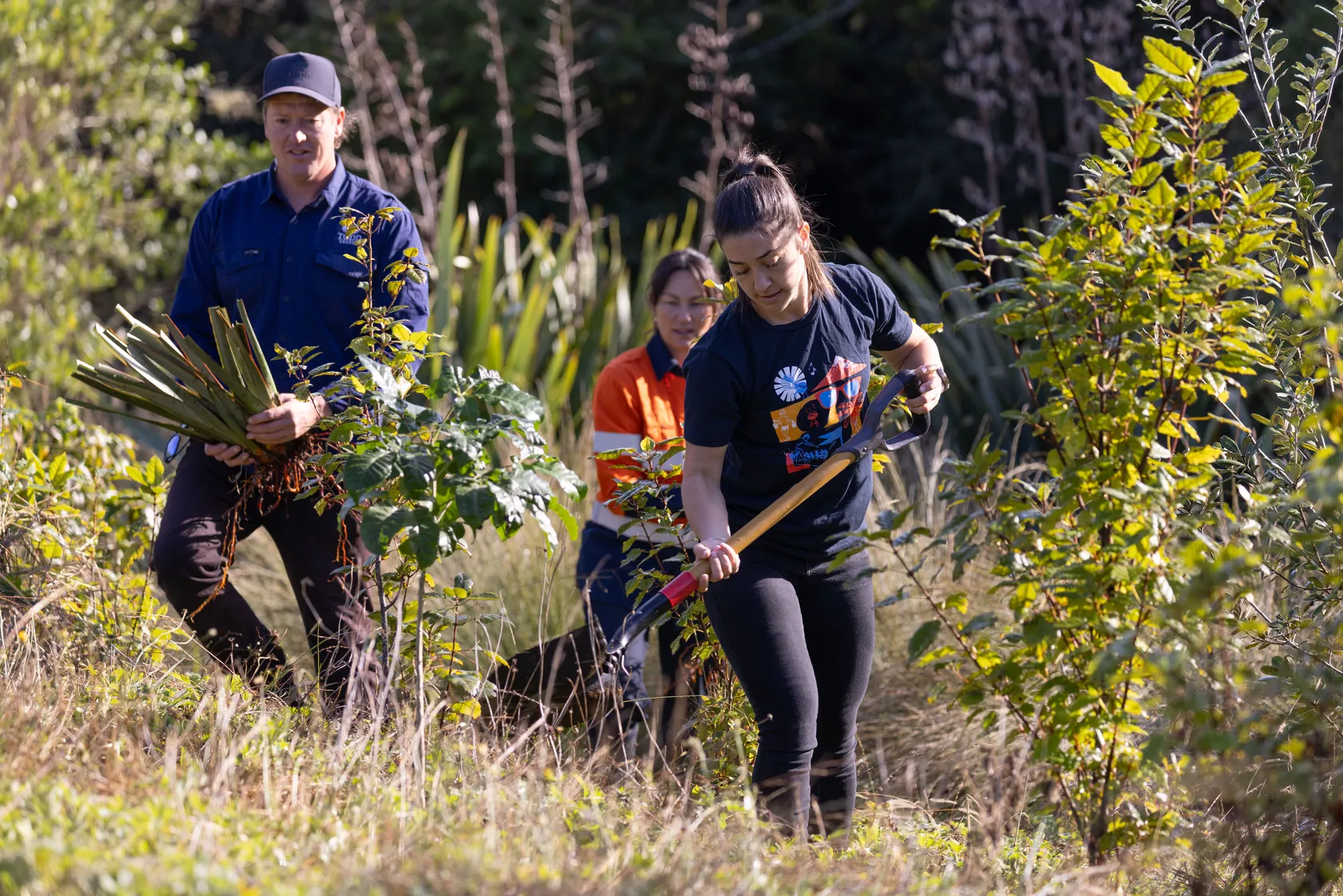 Todd employees planting the whenua near the McKee Mangahewa Production Station